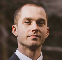 Thomas Whitfield, crypto market expert working as a trading analyst, portrait